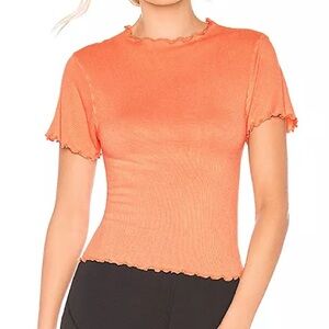 NWOT FP Movement Madeline Funnel Baby Tee in Bright Orange.